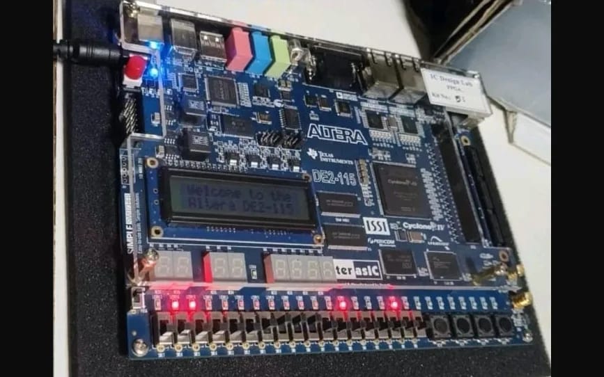 Adaptive Traffic Light Controller — The DE2-115 running the design, its state on the LEDs and the display.